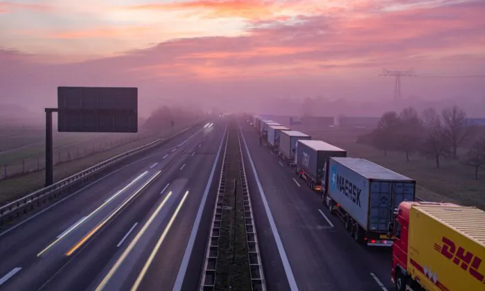 Trucks are jammed in the early morning on Autobahn 12 in front of the German-Polish border crossing near Frankfurt (Oder), Germany, on March 18, 2020. (Patrick Pleul/dpa via AP)