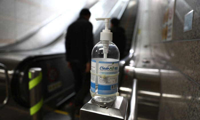 Hand sanitizer is seen at an escalator in Seoul, South Korea, on March 13, 2020. (Chung Sung-jun/Getty Images)
