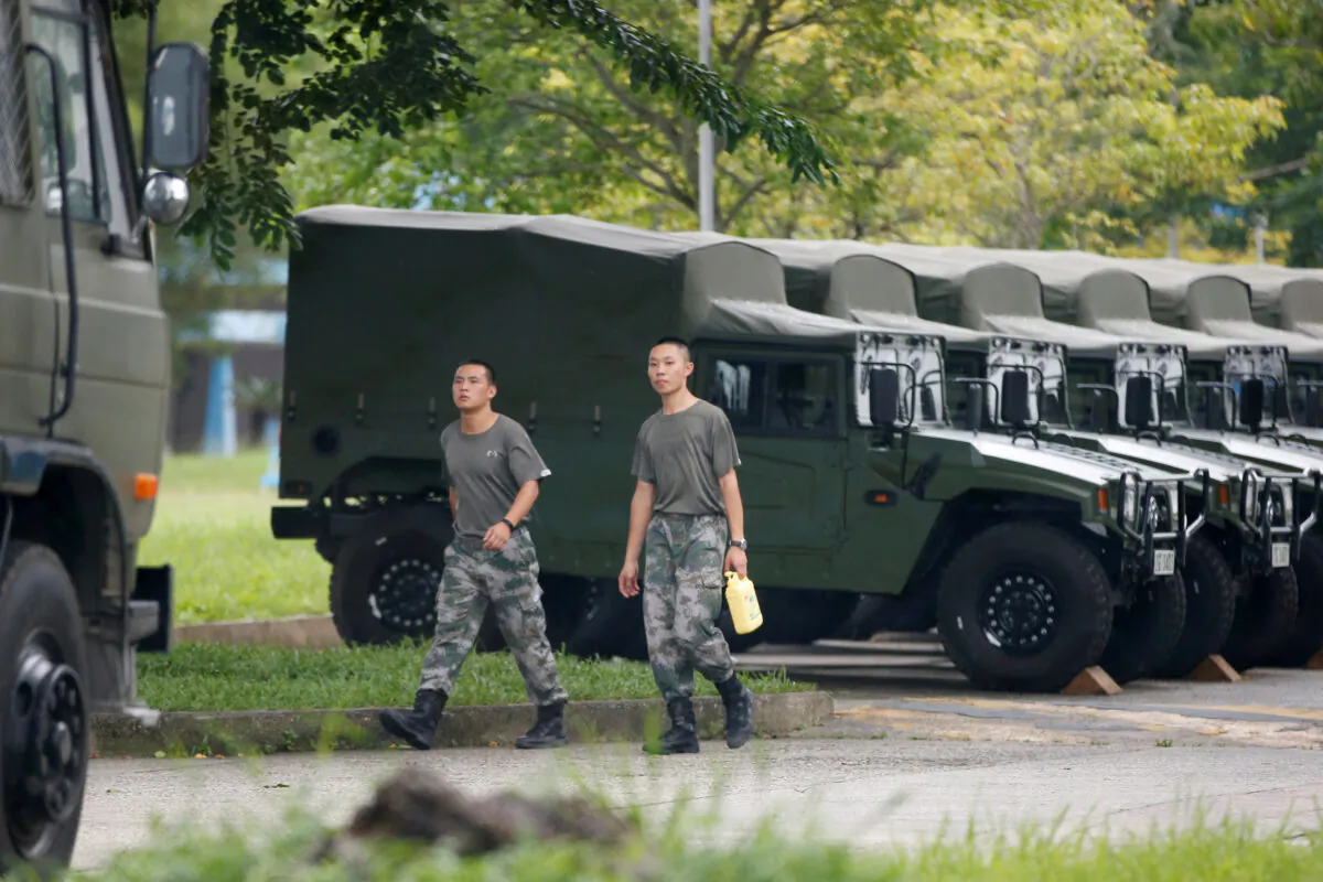 Troops are seen at the Shek Kong military base of People's Liberation Army (PLA) in New Territories, Hong Kong, China, on Aug. 29, 2019. (Reuters)