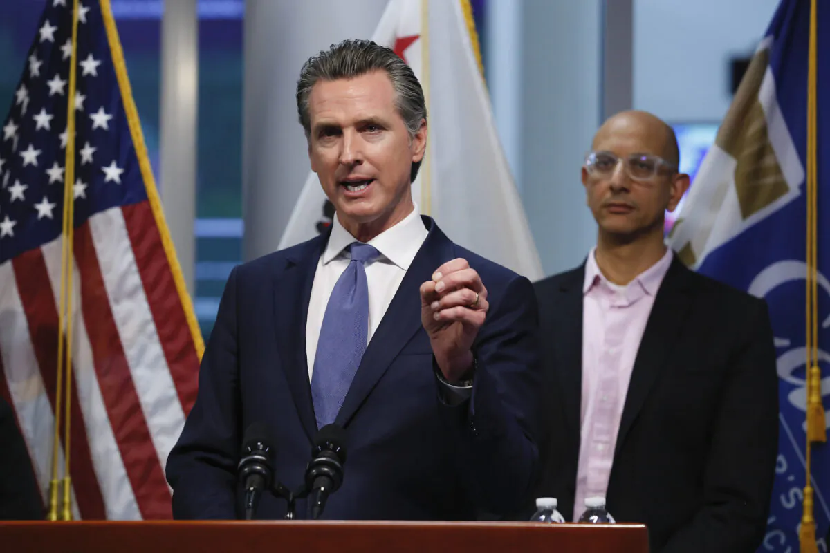 California Gov. Gavin Newsom gives an update to the state's response to the CCP virus at the Governor's Office of Emergency Services in Rancho Cordova, Calif., on March 17, 2020. (AP Photo/Rich Pedroncelli, Pool)