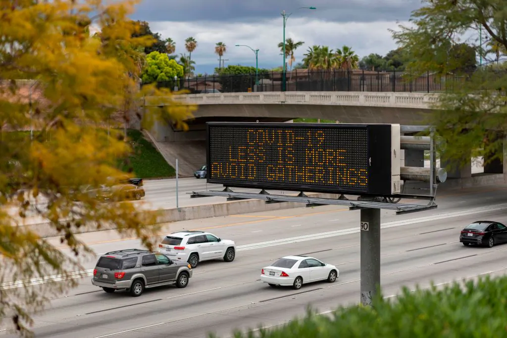 A Caltrans Changeable Message Sign (CMS) warns motorists on the Interstate 5 freeway in Anaheim, Calif., on March 14, 2020. (David McNew/AFP via Getty Images)