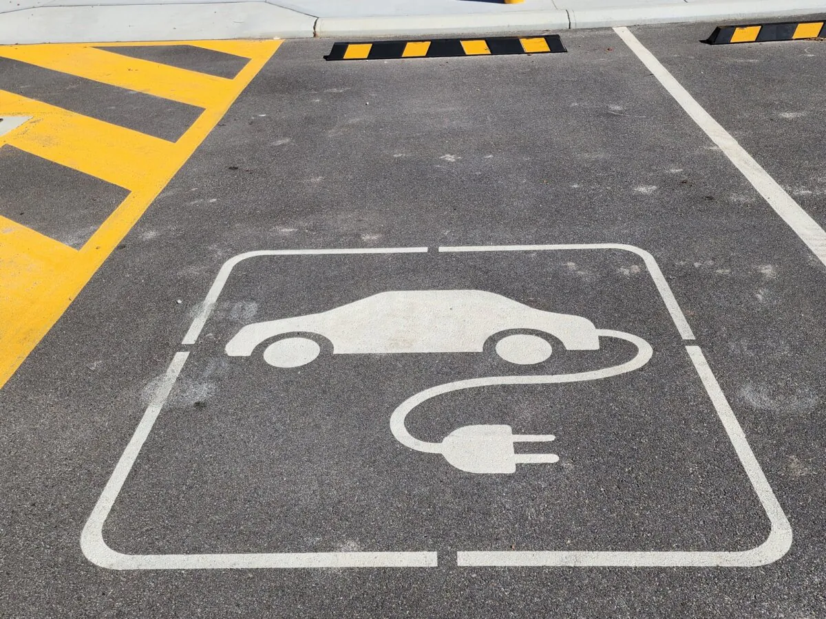 A sign indicating an electric vehicle charging station parking bay in Albany, Western Australia, on April 19, 2024. (Susan Mortimer/The Epoch Times)