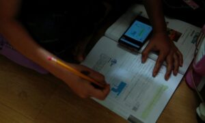 A Poorer Student Falls Behind in Hong Kong as Coronavirus Forces Online Learning