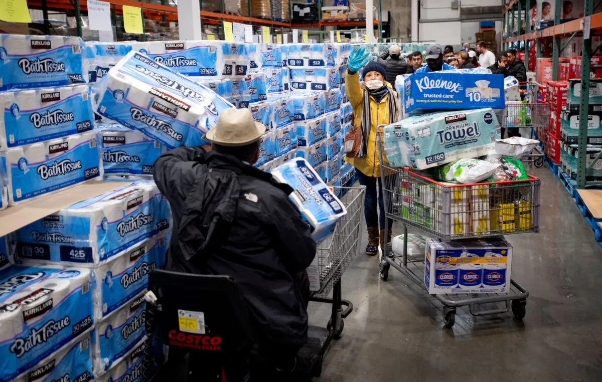 People shop for toilet paper at a Costco store in Novato, Calif., on March 14, 2020. (Josh Edelson/AFP via Getty Images)