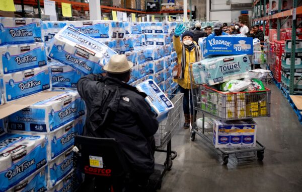 People shop for toilet paper