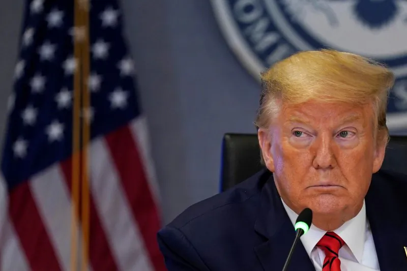 President Donald Trump attends a teleconference with governors to discuss partnerships to "prepare, mitigate, and respond to COVID-19" at the headquarters of the Federal Emergency Management Agency in Washington on March 19, 2020. (Evan Vucci/Pool via Reuters)