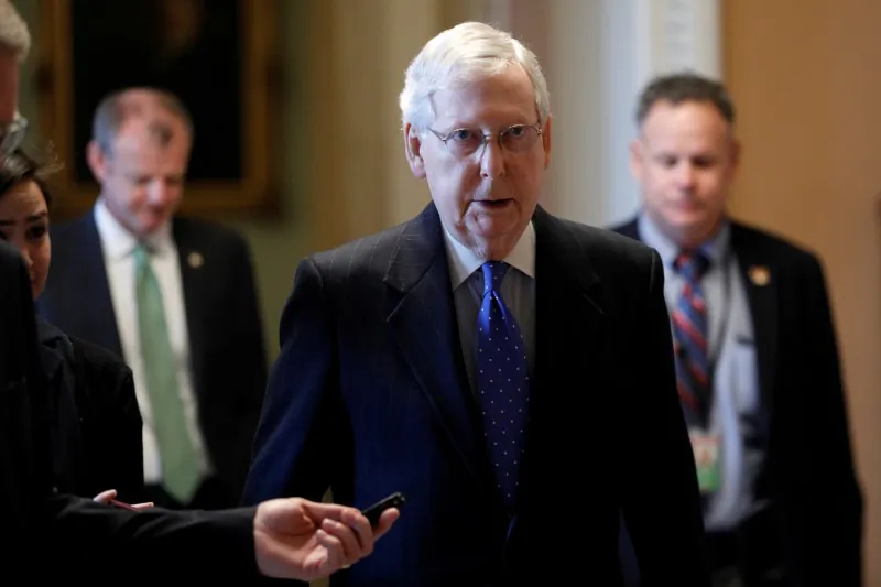 U.S. Senate Majority Leader Mitch McConnell (R-Ky.) speaks to members of the news media while walking into his office on Capitol Hill in Washington on March 17, 2020. (Tom Brenner/Reuters)