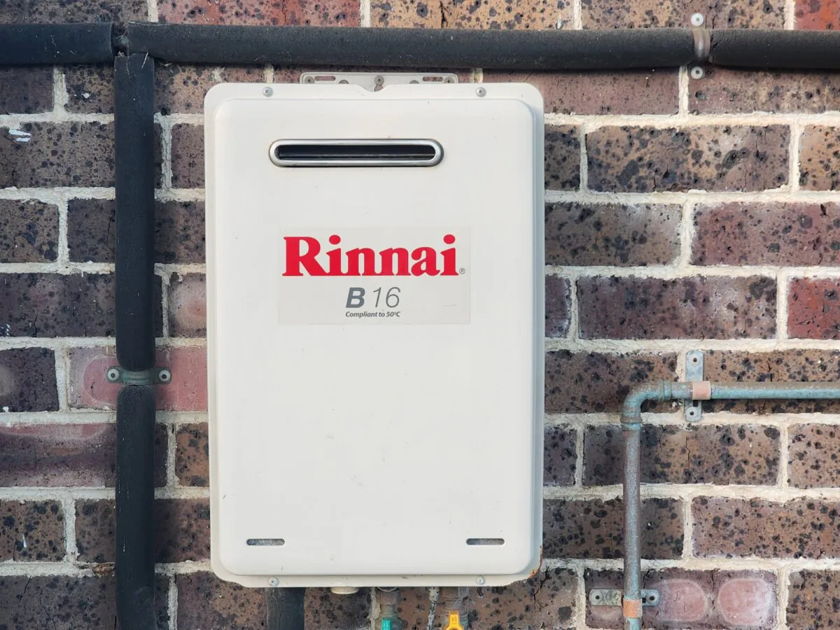 A Rinnai gas hot water system is seen on a building in Albany, Western Australia, on Aug. 21, 2024. (Susan Mortimer/The Epoch Times)