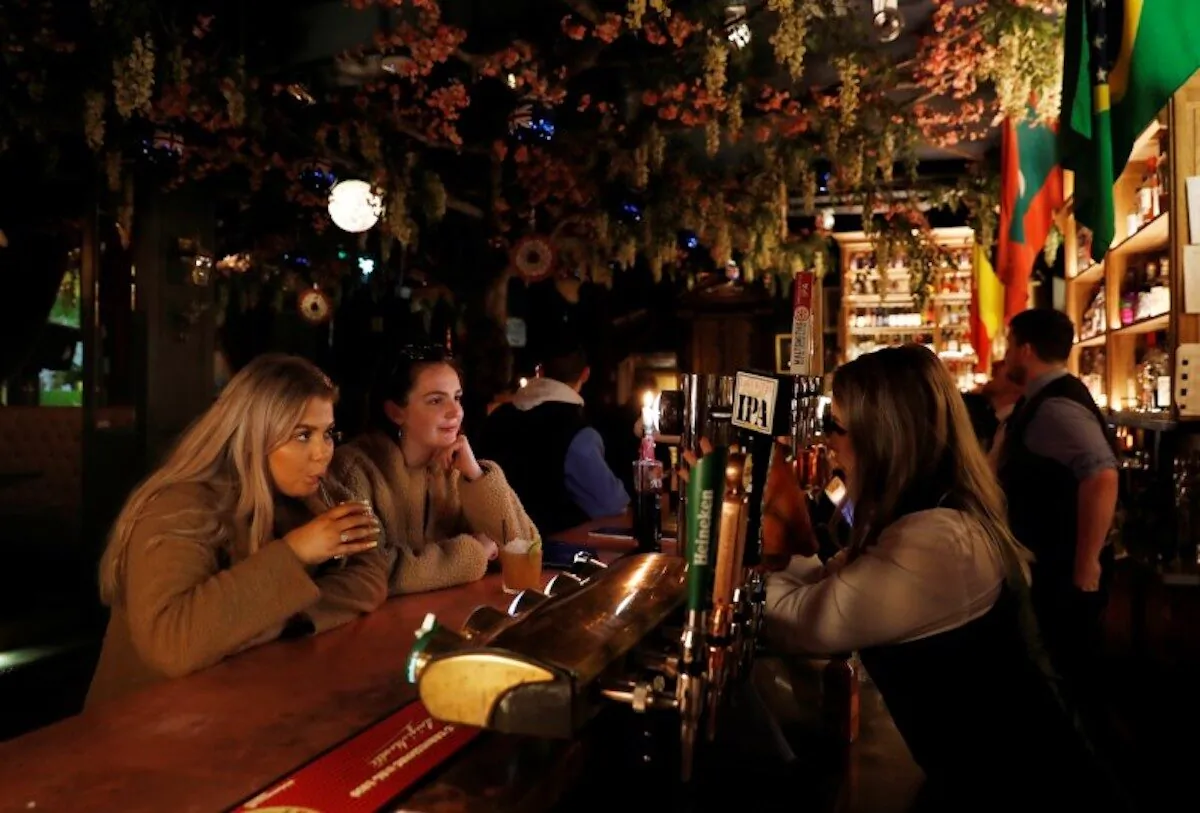 People in a bar in Newcastle, England, on March 20, 2020. (Lee Smith/Reuters)