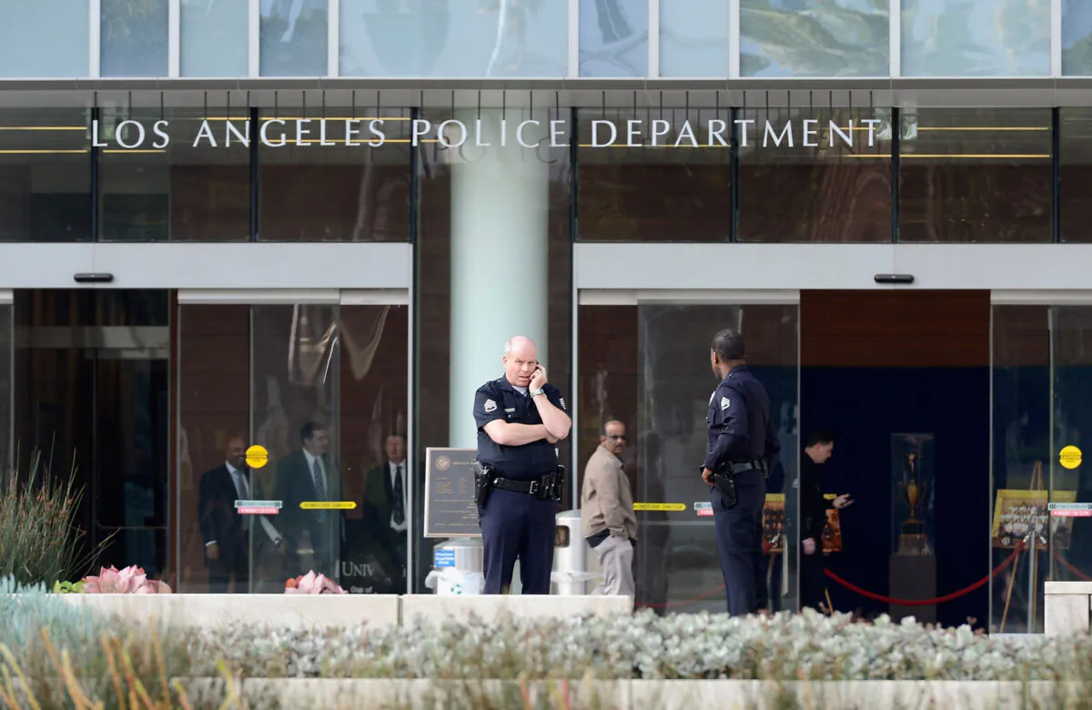 Los Angeles Police Department officers are deployed around the police headquarters in Los Angeles, Calif., on Feb. 7, 2013. (Kevork Djansezian/Getty Images)