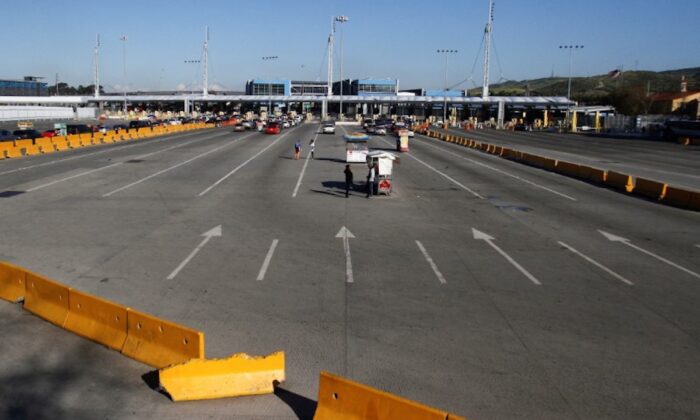 A general view shows an almost empty Mexico-U.S. San Ysidro border crossing after the United States and Mexico have agreed to restrict non-essential travel over their shared border to limit the spread of the CCP virus, in Tijuana, Mexico, on March 21, 2020. (Jorge Duenes/Reuters)