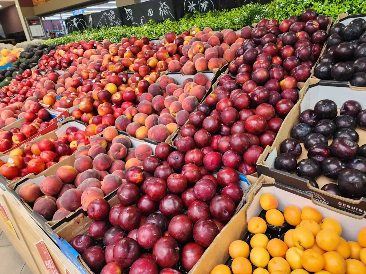 A variety of seasonal fruits is displayed outside a supermarket in Albany, Western Australia, on Dec. 22, 2023. (Susan Mortimer/The Epoch Times)