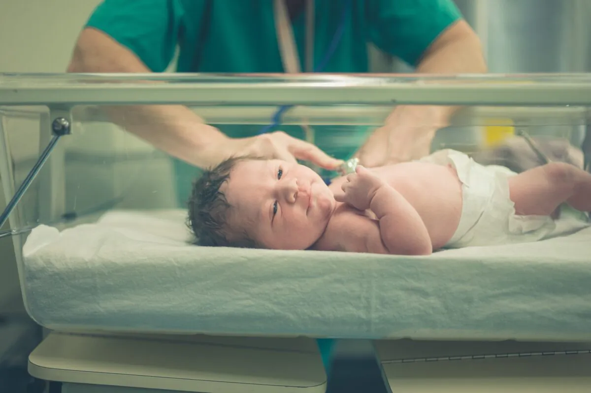 A newborn baby is cared for at a hospital in a file photo. (Lolostock/Shutterstock)