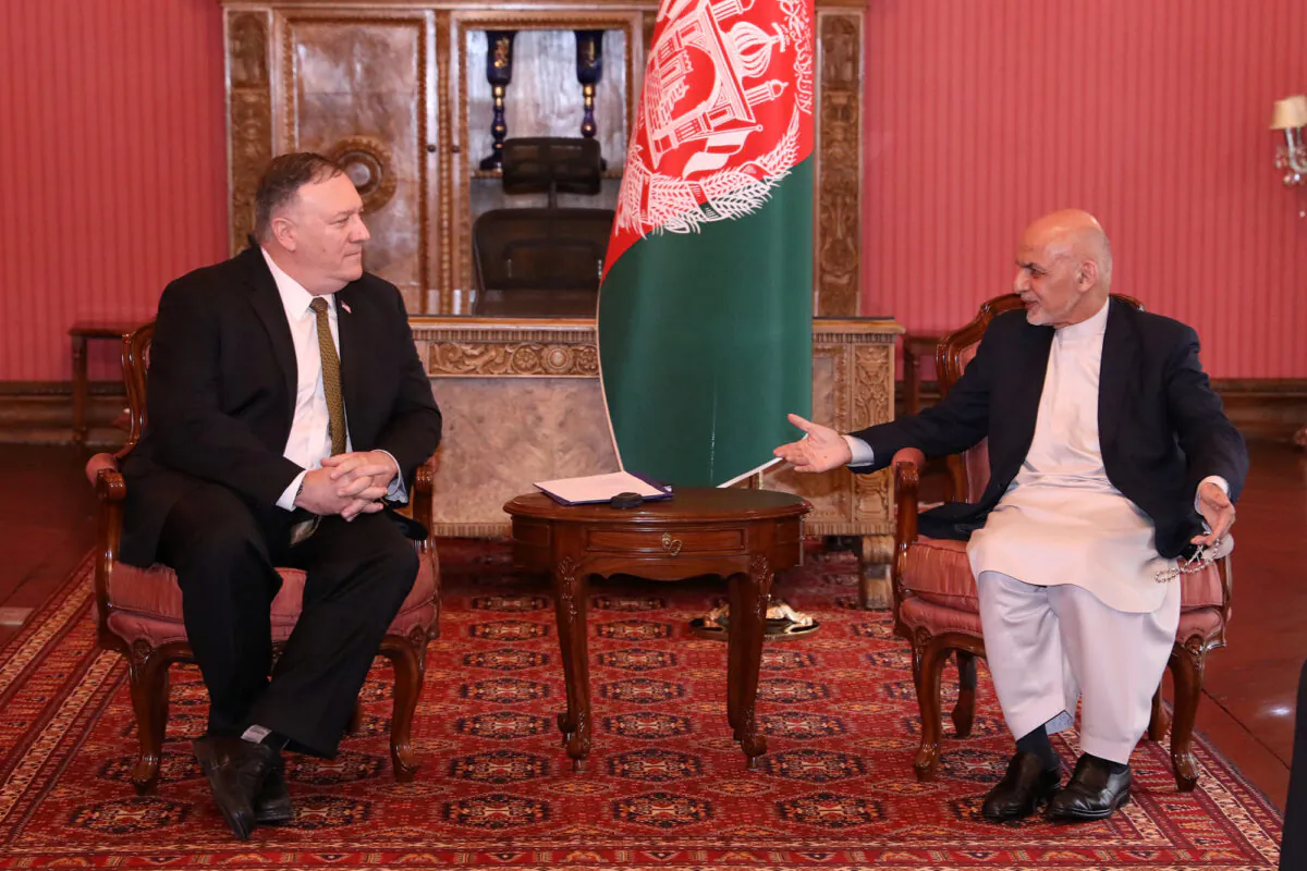 Afghanistan's President Ashraf Ghani (R) meets with U.S. Secretary of State Mike Pompeo in Kabul, Afghanistan, on March 23, 2020. (Afghan Presidential Palace Handout via Reuters)