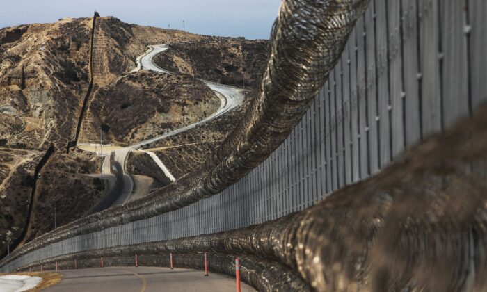 A section of the U.S.-Mexico border fence stands in San Diego, Calif., on July 16, 2018. (Mario Tama/Getty Images)