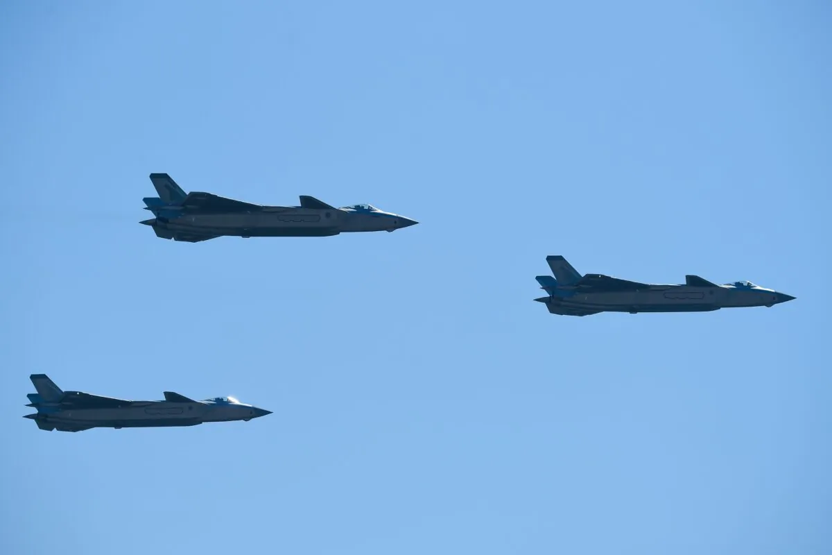 Chinese J-20 stealth fighters perform at the Airshow China 2018 in Zhuhai, Guangdong Province, China, on Nov. 6, 2018. (Wang Zhao/AFP via Getty Images)