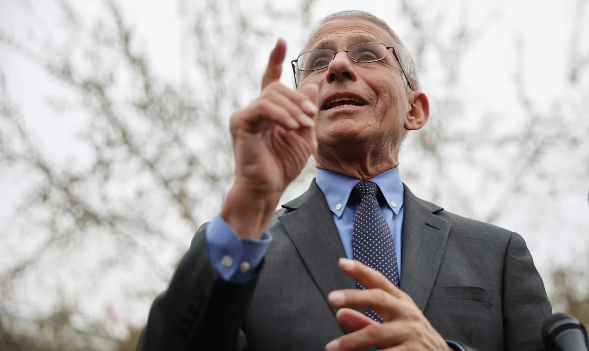 National Institute Of Allergy And Infectious Diseases Director Anthony Fauci talks to reporters about the Trump administration's response to the global coronavirus outbreak outside the White House on March 12, 2020. (Chip Somodevilla/Getty Images)
