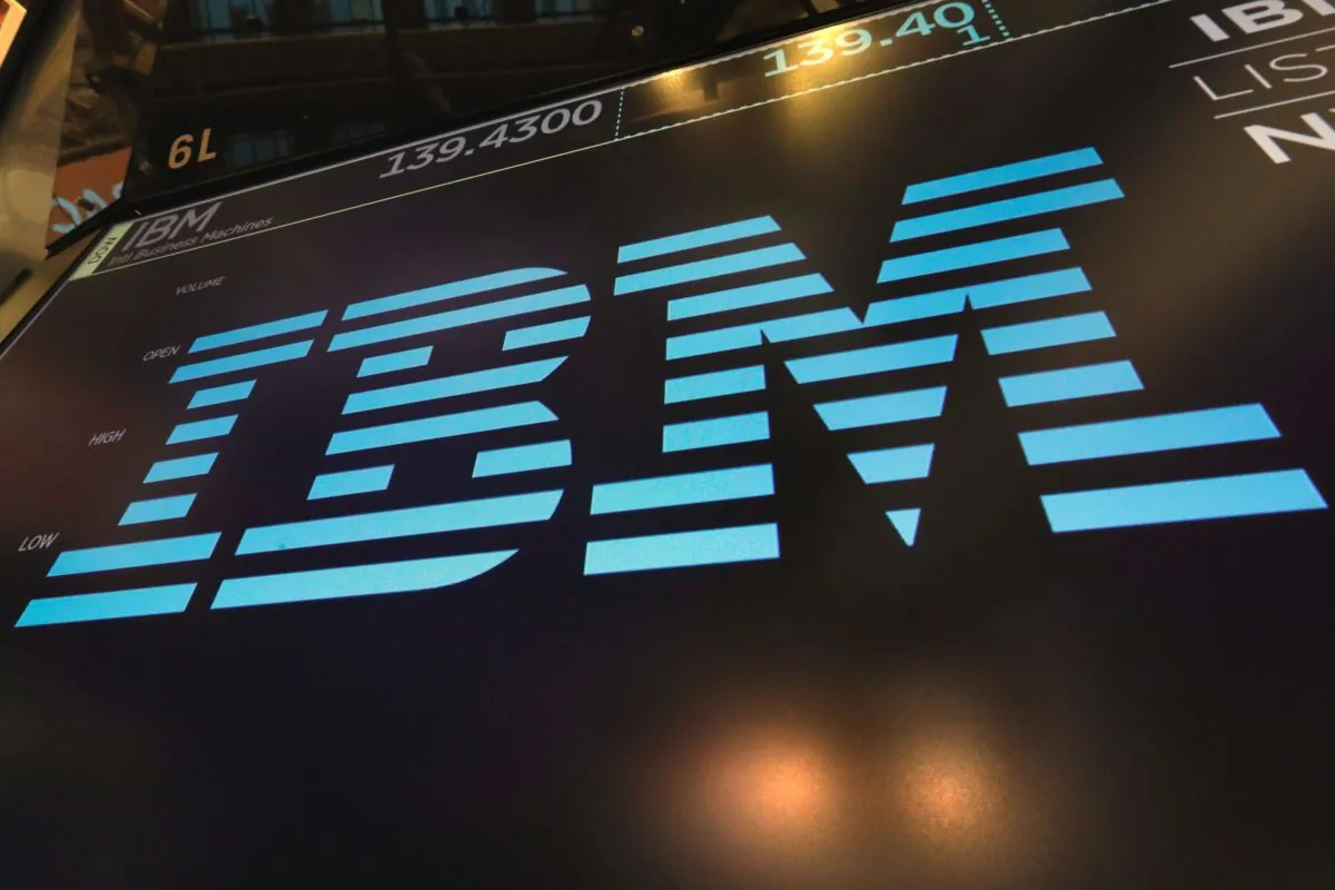 The logo for IBM appears above a trading post on the floor of the New York Stock Exchange on March 18, 2019. (Richard Drew, File/AP Photo)