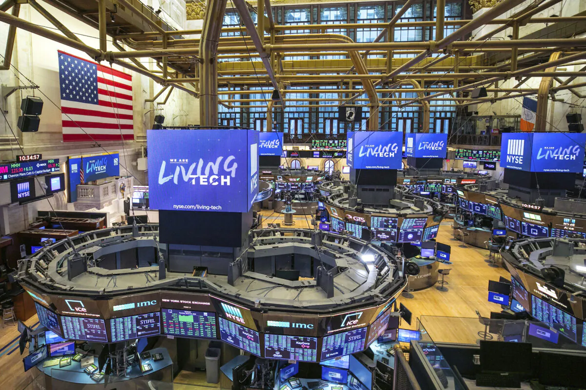 This photo provided by the New York Stock Exchange shows the unoccupied NYSE trading floor, closed temporarily for the first time in 228 years as a result of the CCP virus, on March 24, 2020. (Kearney Ferguson via AP)