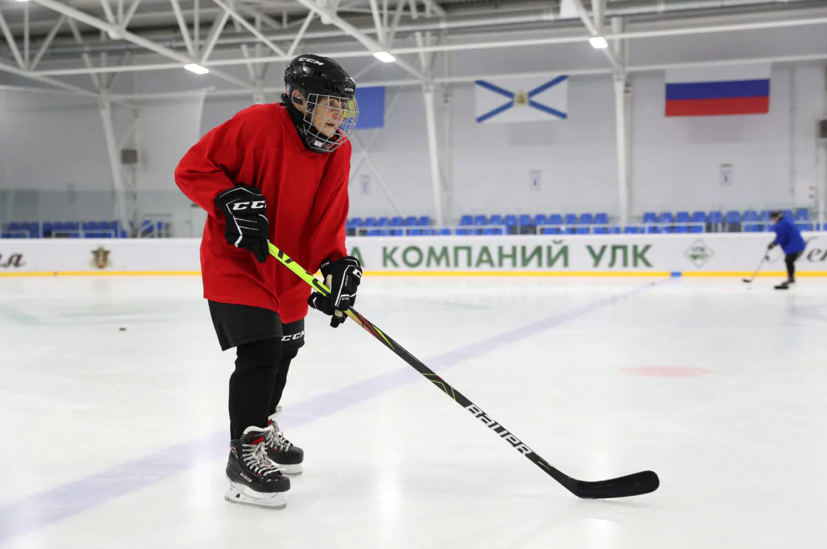 Valentina Fyodorova, 80, the captain of a senior women's hockey team, attends a training session in the village of Bereznik in Arkhangelsk region, Russia, March 5, 2020. (REUTERS/Evgenia Novozhenina)