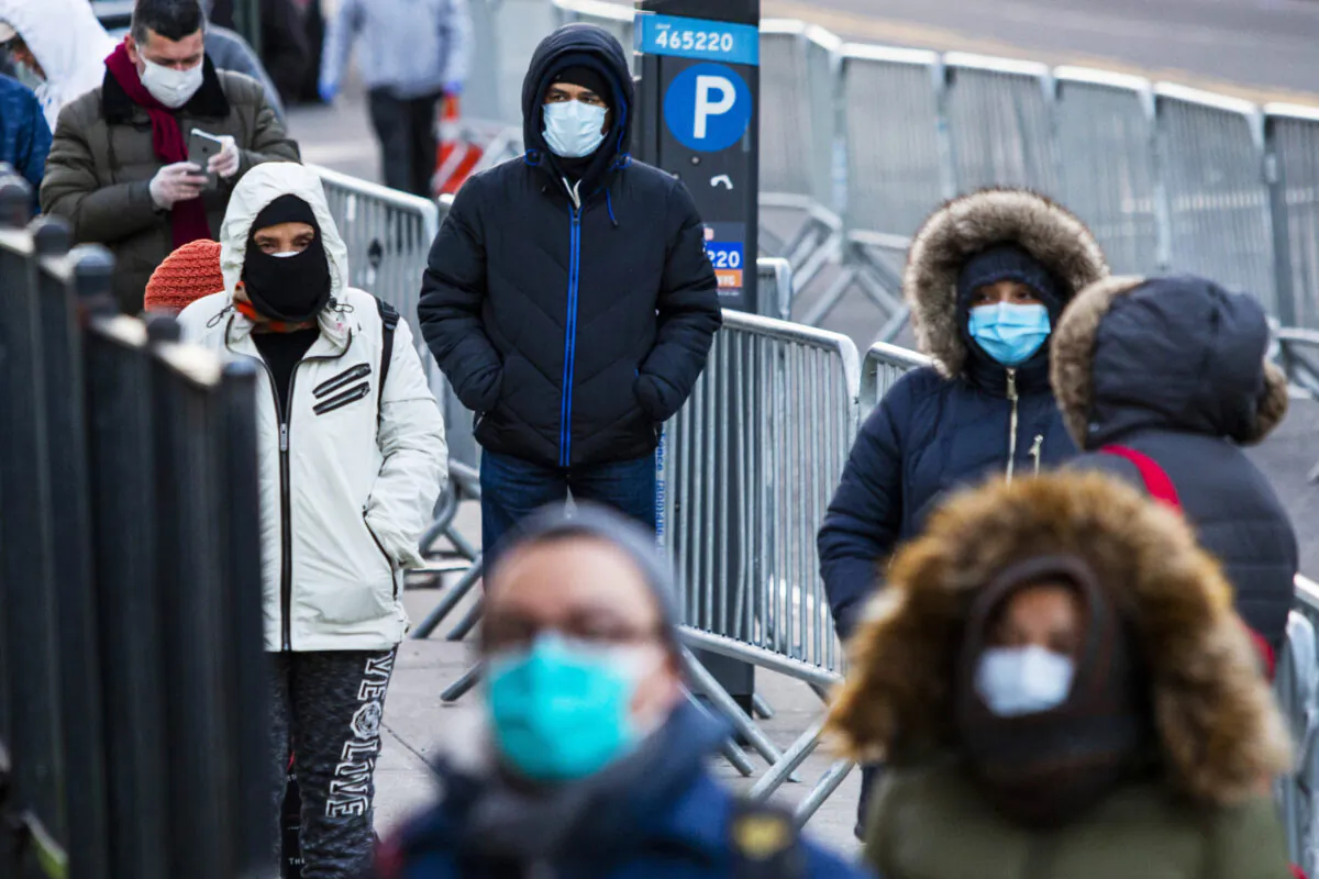 People line up to get a test at Elmhurst Hospital due to CCP virus outbreak. in Queens, New York, United States on March 24, 2020. (Eduardo Munoz Alvarez/Getty Images)