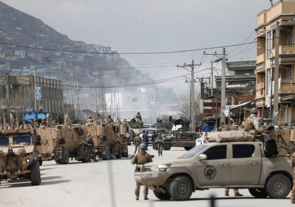 Afghan security forces inspect near the site of an attack in Kabul, Afghanistan, on March 25, 2020. (Mohammad Ismail/Reuters)