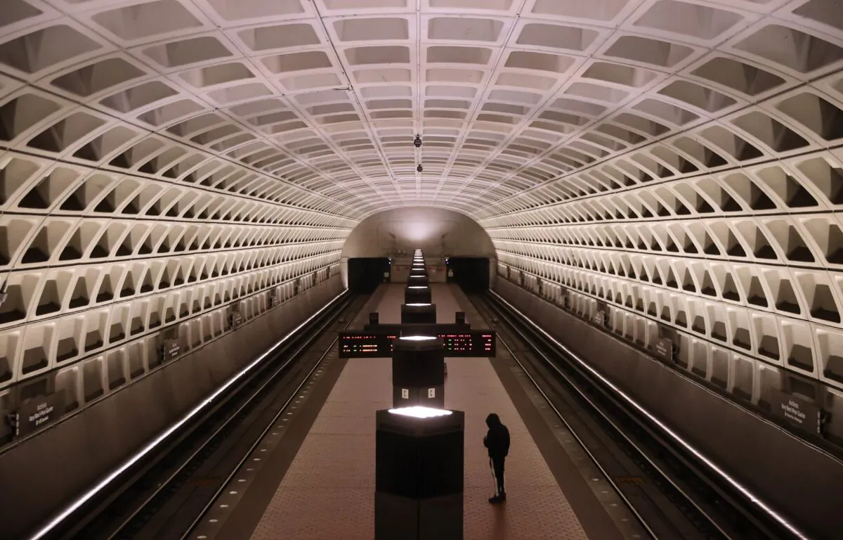 A single rider waits on a train platform at the Archives station as weekday rail ridership across the Metro system is down nearly 90-percent due to the coronavirus pandemic  in Washington on March 25, 2020. (Chip Somodevilla/Getty Images)