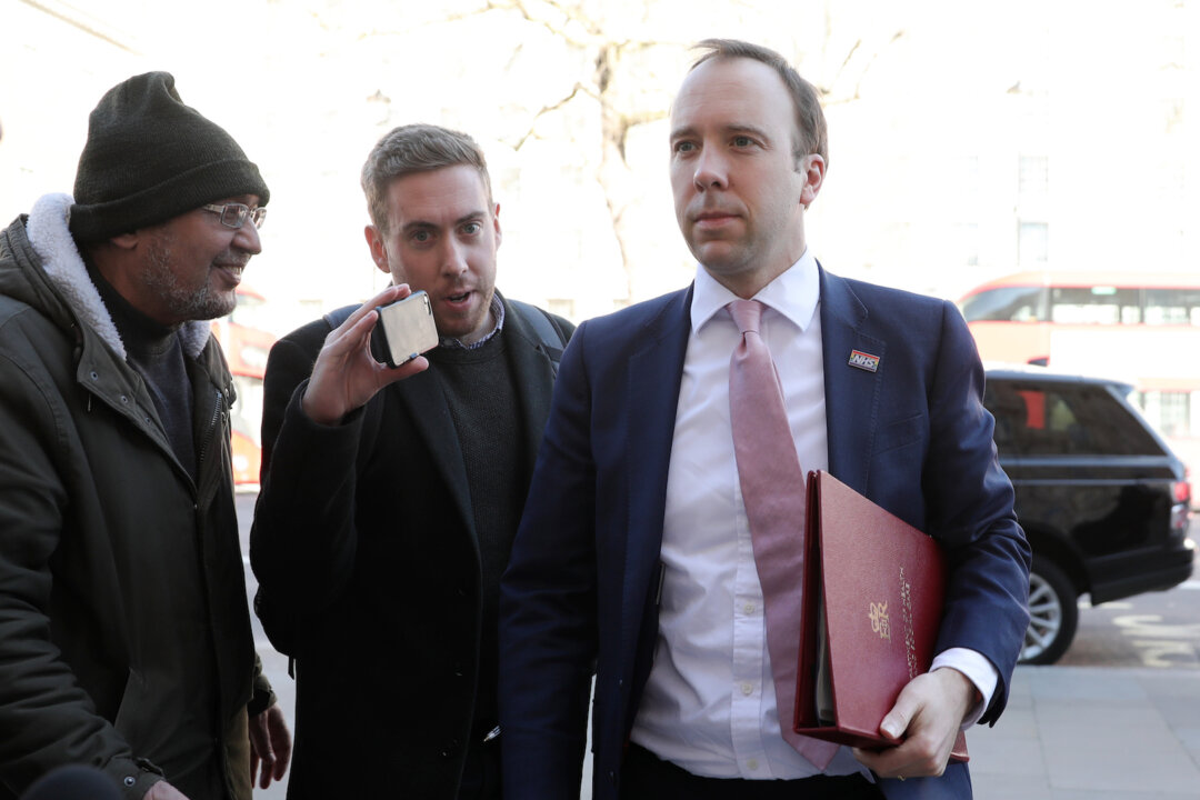 Matt Hancock, Secretary of State for Health and Social Care, arrives at the Cabinet Office in Whitehall ahead of a meeting of the government's emergency committee Cobra to discuss the CCP virus response, in London on March 16, 2020. (Dan Kitwood/Getty Images)