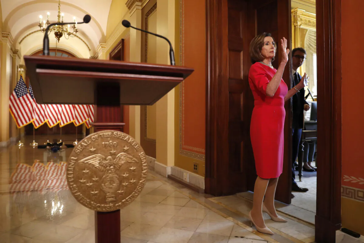 House Speaker Nancy Pelosi speaks outside her office on Capitol Hill, on March 23, 2020. (Andrew Harnik/AP Photo, Pool)