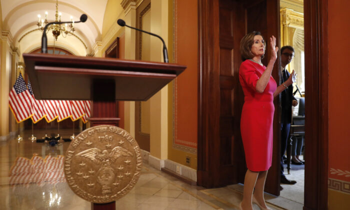 House Speaker Nancy Pelosi speaks outside her office on Capitol Hill, on March 23, 2020. (Andrew Harnik/AP Photo, Pool)