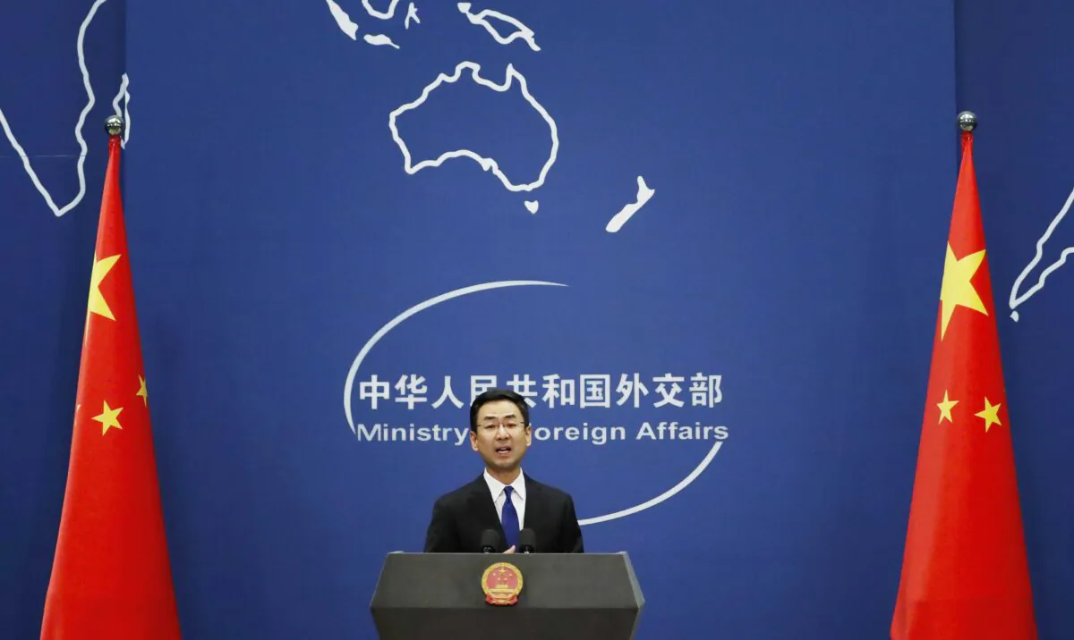 Chinese Foreign Ministry spokesman Geng Shuang speaks during a daily briefing at the Ministry of Foreign Affairs office in Beijing on March 18, 2020. American journalists were expelled from China in retaliation for a new limit imposed by the Trump administration on visas for Chinese state-owned media operating in the United States. (Andy Wong/AP Photo)