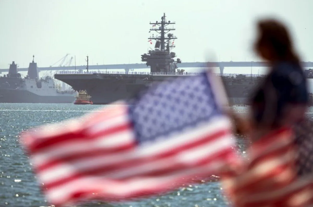 The USS Ronald Reagan, a Nimitz-class nuclear-powered super carrier, is followed by the USS Somerset as it departs for Yokosuka, Japan from Naval Station North Island in San Diego, Calif., on Aug. 31, 2015. (Mike Blake/File Photo/Reuters)