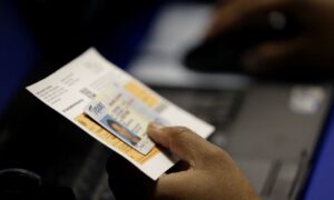 NY County voters wrongly labeled as Democrats on IDs.