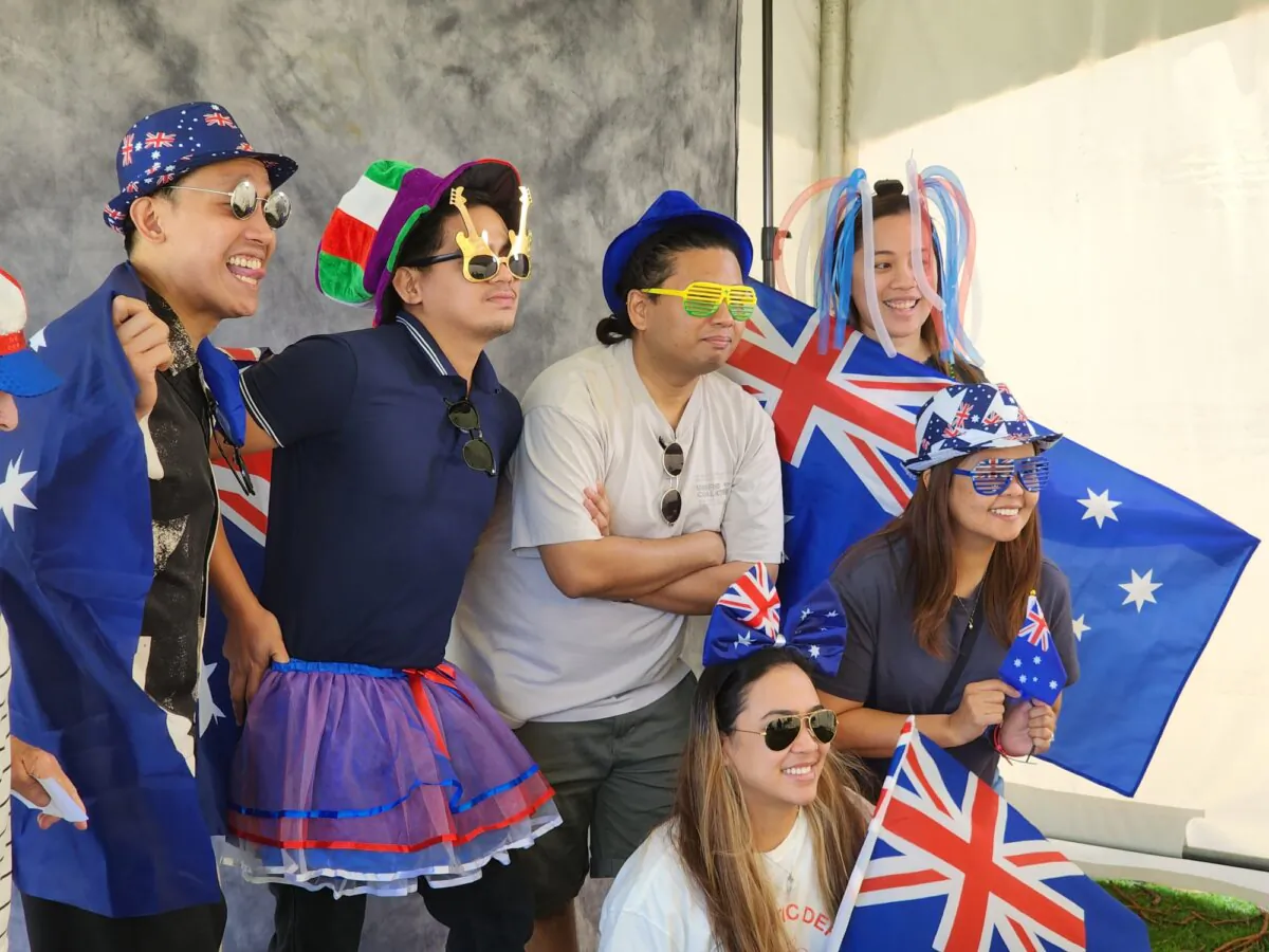 People dress in props to have their photo taken at an event to celebrate Australia Day in Albany, Western Australia, on Jan. 26, 2024. (Susan Mortimer/The Epoch Times)