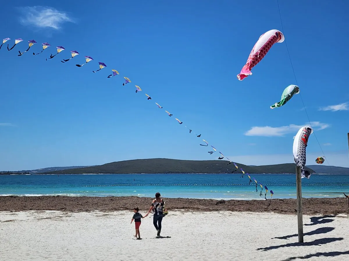 People walk on a beach in Albany, Western Australia, on Jan. 26, 2024. (Susan Mortimer/The Epoch Times)
