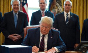 Trump Signs Largest Stimulus Bill in Modern US History