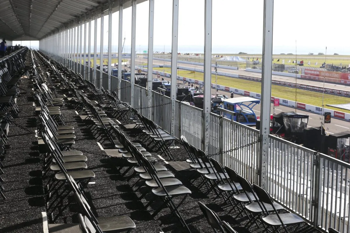 The spectator VIP area overlooking pit lane is virtually empty during the opening day of the Firestone Grand Prix of St. Petersburg in St. Petersburg, on March 13, 2020. (Dirk Shadd/Tampa Bay Times via AP)
