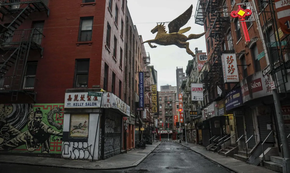 A street in New York's Chinatown is empty, the result of citywide restrictions calling for people to stay indoors and maintain social distancing in an effort to curb the spread of COVID-19, in New York on March 28, 2020. (Bebeto Matthews/AP Photo)