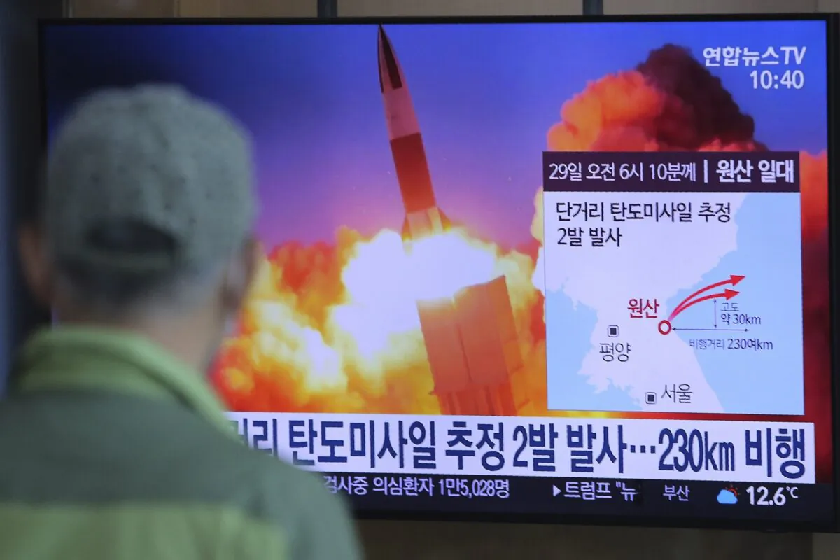 A man watches a TV screen showing a file image of North Korea's missile launch during a news program at the Seoul Railway Station in Seoul, South Korea on March 29, 2020. (Ahn Young-joon/AP Photo)