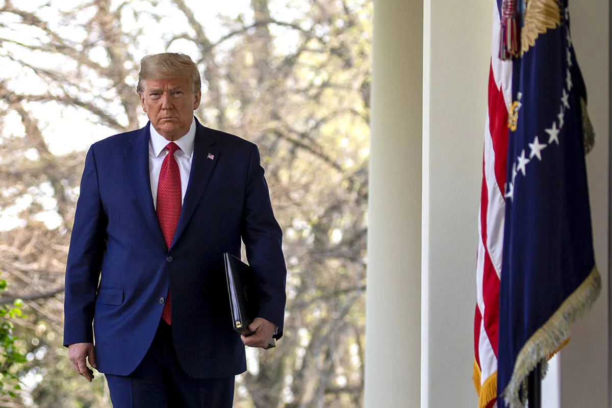 President Donald Trump walks to the Rose Garden for the daily coronavirus briefing at the White House in Washington,  on March 29, 2020. (Tasos Katopodis/Getty Images)