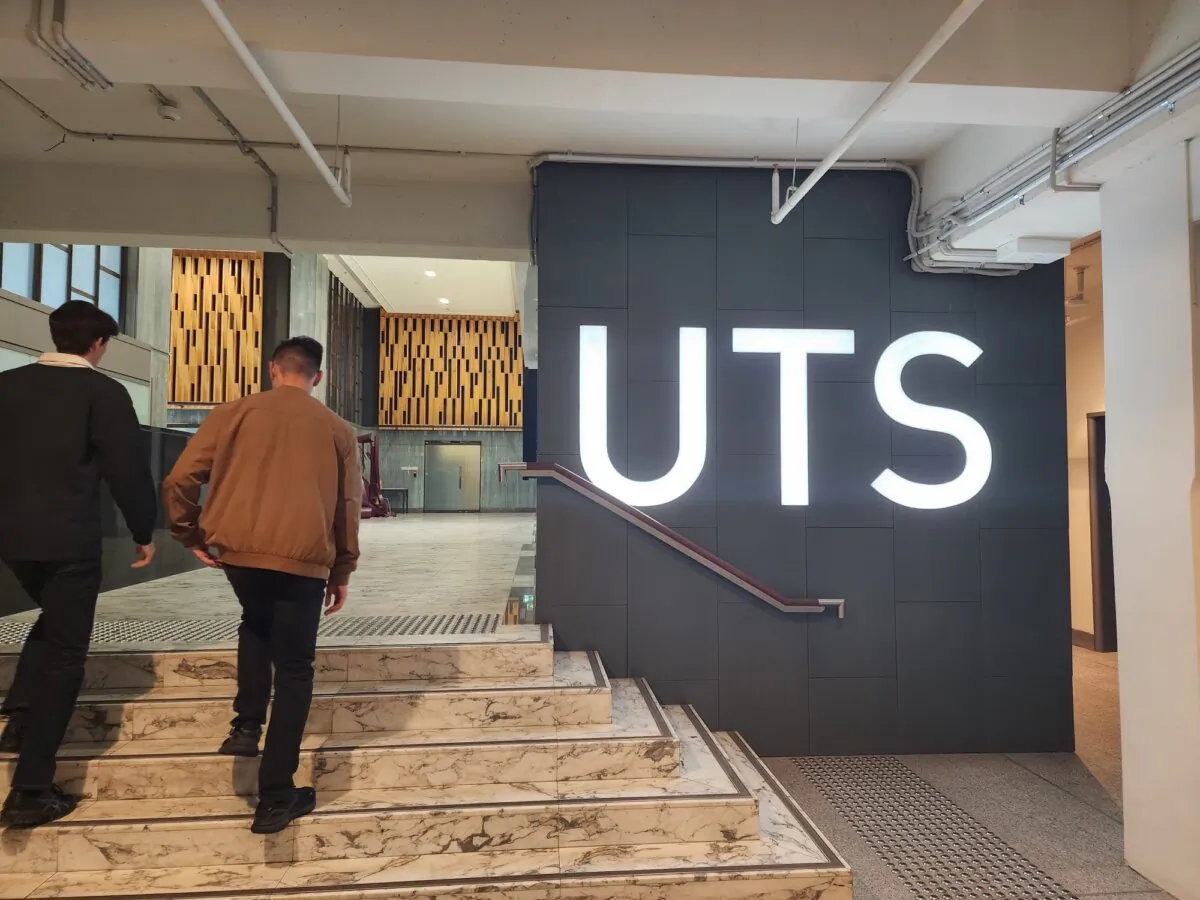 Two students walk through the University of Technology Sydney in Sydney, Australia, on Oct. 26, 2024. (Susan Mortimer/The Epoch Times)