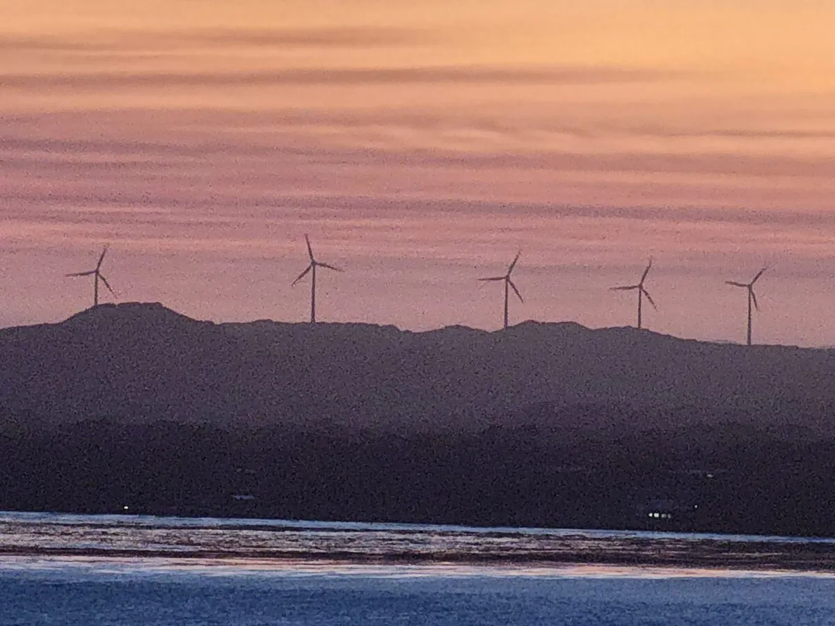 Wind turbines at sunset in Albany, Western Australia, on Oct. 28, 2024. (Susan Mortimer/The Epoch Times)