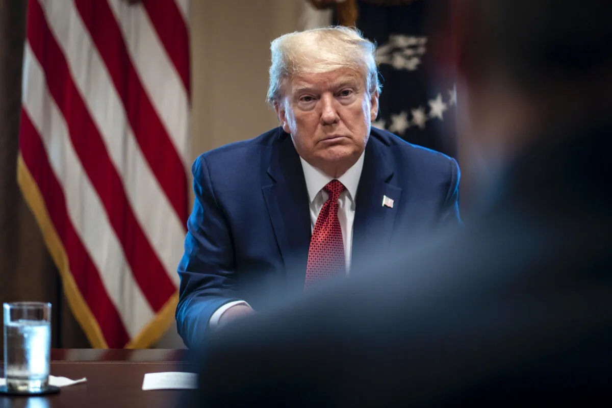 President Donald Trump meets with supply chain distributors in reference to the CCP virus pandemic, in the Cabinet Room in the West Wing at the White House on March 29, 2020. (Pete Marovich-Pool/Getty Images)