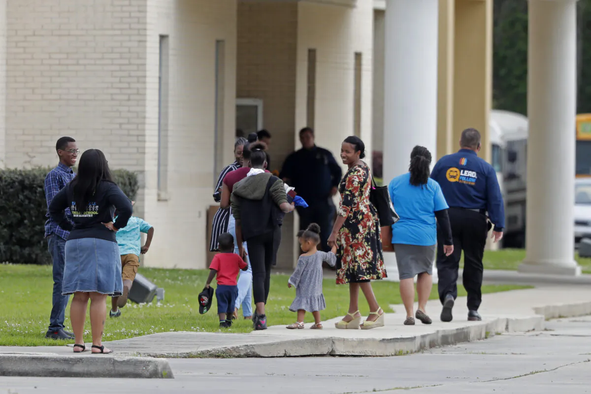 Congregants arrive at the Life Tabernacle Church in Central, Louisiana, on March 29, 2020. (Gerald Herbert/AP Photo)