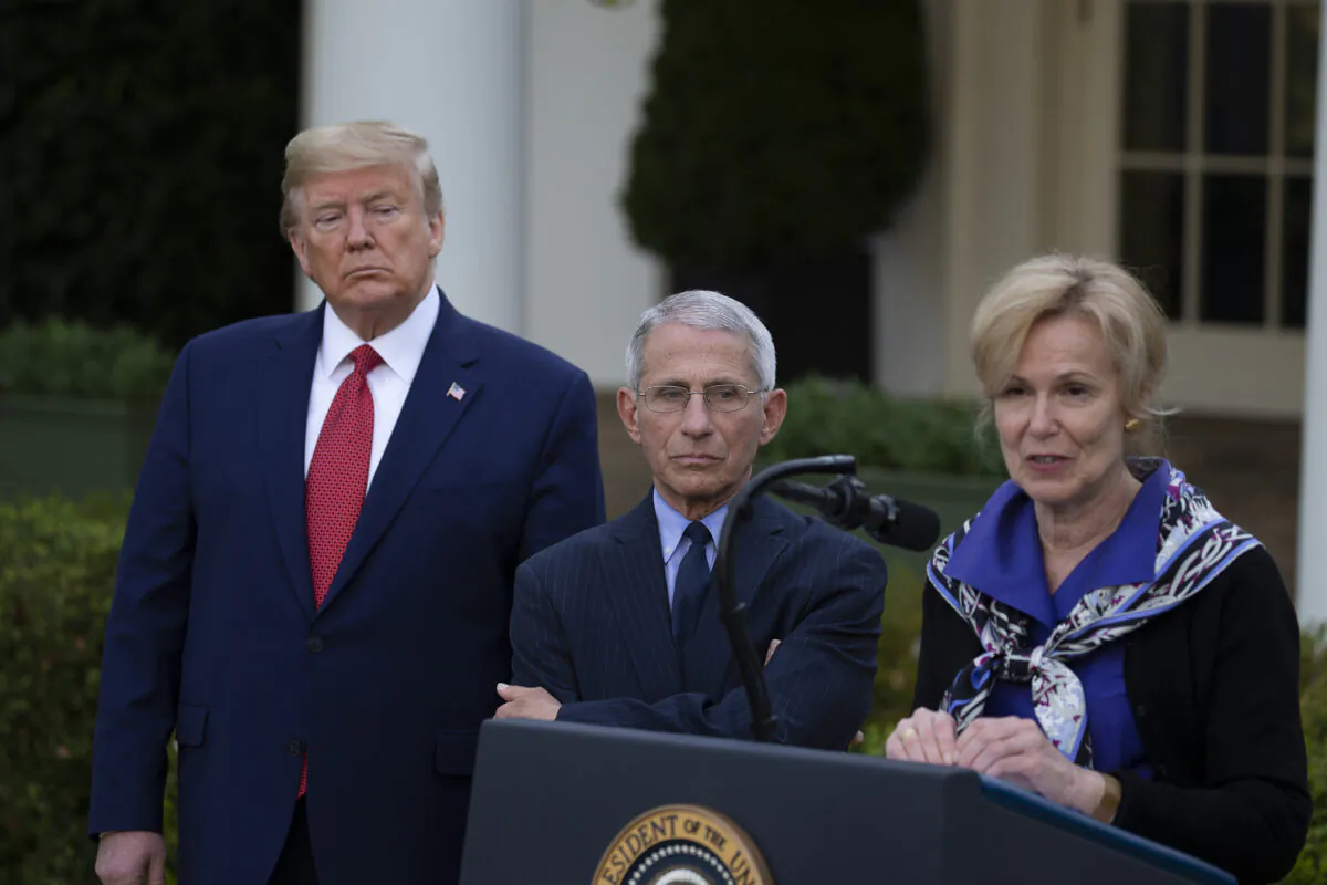 Then-President Donald Trump and Dr. Anthony Fauci listen to Dr. Deborah Birx speak in the Rose Garden at the White House in Washington on March 29, 2020. (Tasos Katopodis/Getty Images)