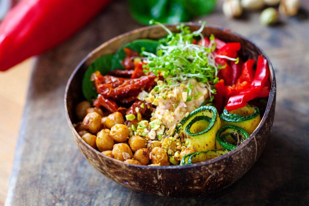 Potato chips and soda are plant-based foods, but have nowhere near the nutrition of whole foods like legumes, vegetables, and fruit. (Magdanatka/Shutterstock)