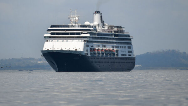 The Zaandam cruise ship enters the Panama City Bay to be assisted