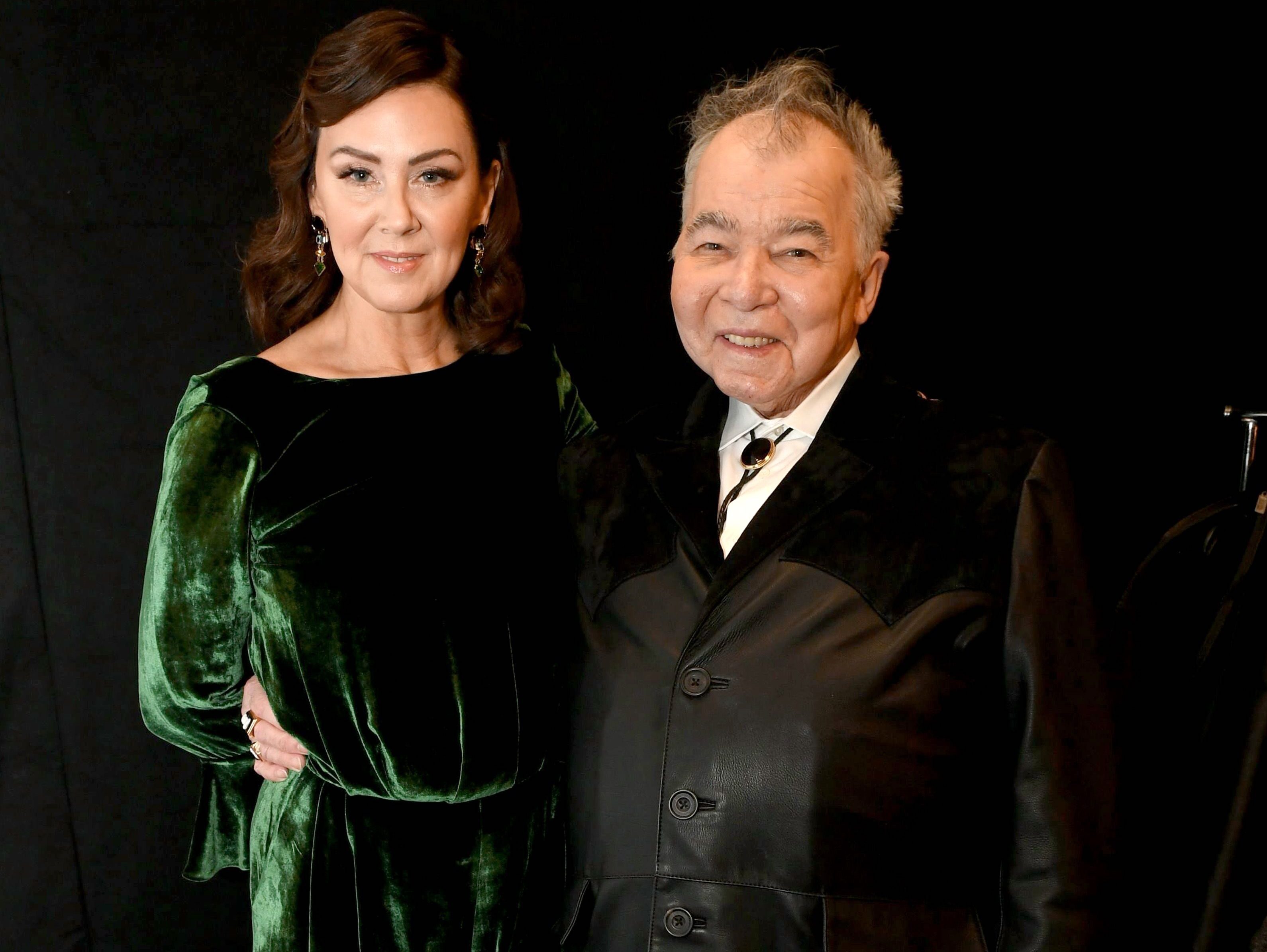 Fiona Whelan (L) and John Prine