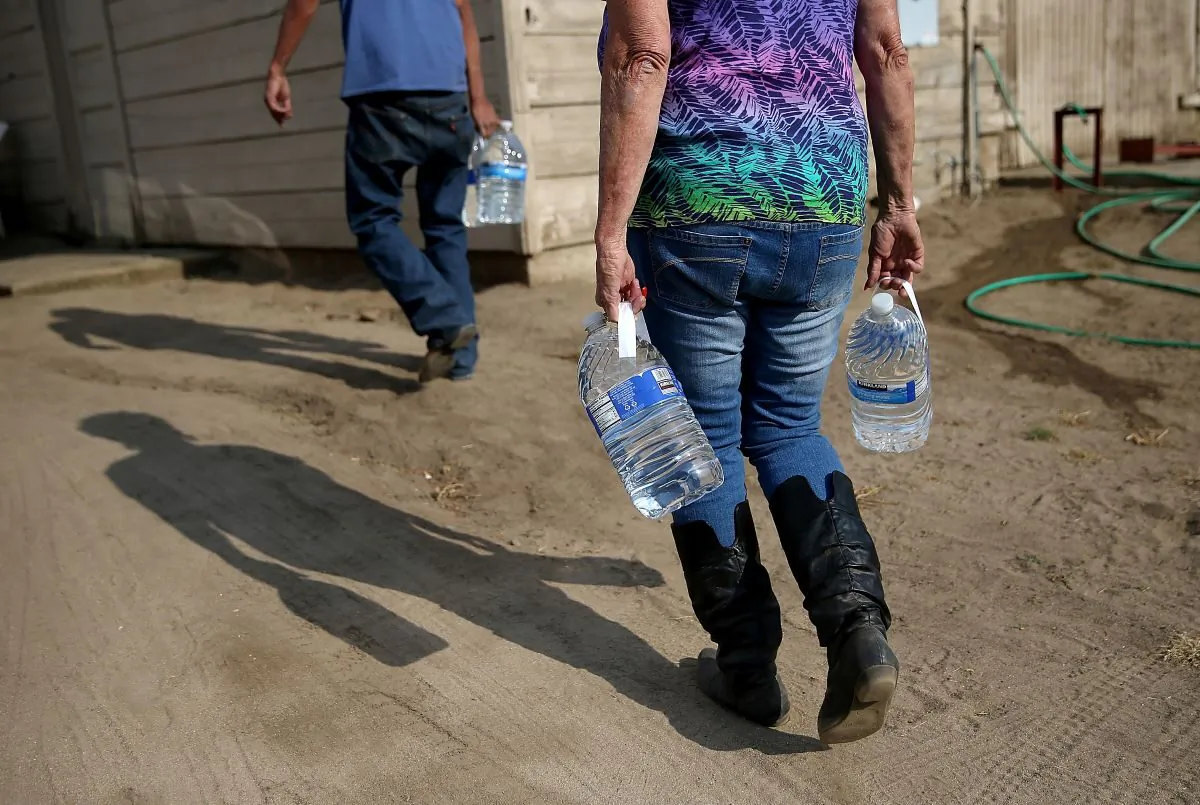 Water is delivered to residents facing severe water shortage in Porterville, California on April 23, 2015. A group of water advocates urged the state administration on March 30, 2020 for an immediate statewide moratorium on water shutoffs amid COVID-19 pandemic. (Justin Sullivan/Getty Images)