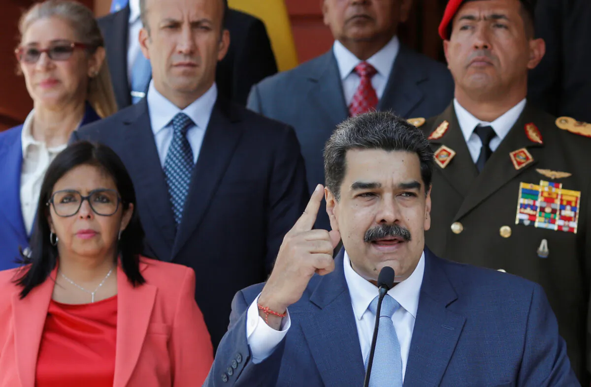 Venezuelan regime leader Nicolas Maduro speaks during a news conference at Miraflores Palace in Caracas, Venezuela, March 12, 2020. (Manaure Quintero/Reuters)